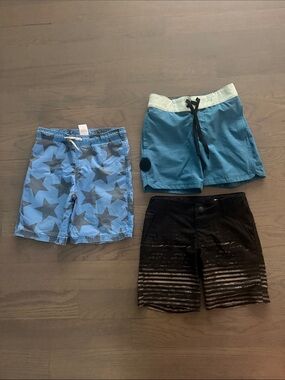 3 pair of boys swim suits- all size 6
